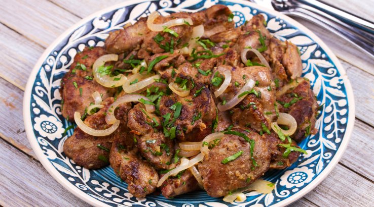 Свинина з цибулею в духовці