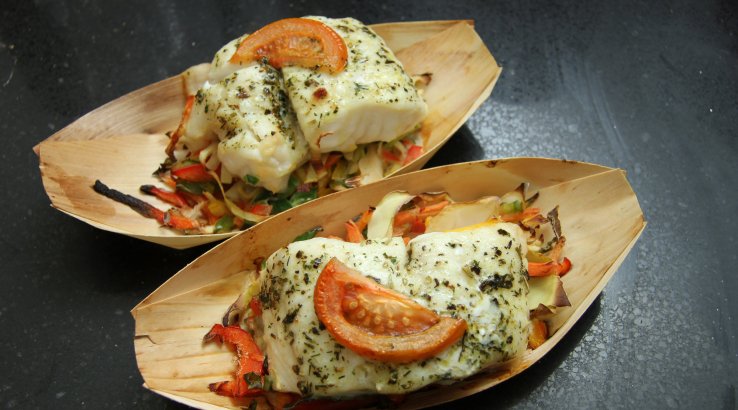 Зубатка, запечена з томатами