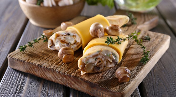 Млинці з печерицями і сиром