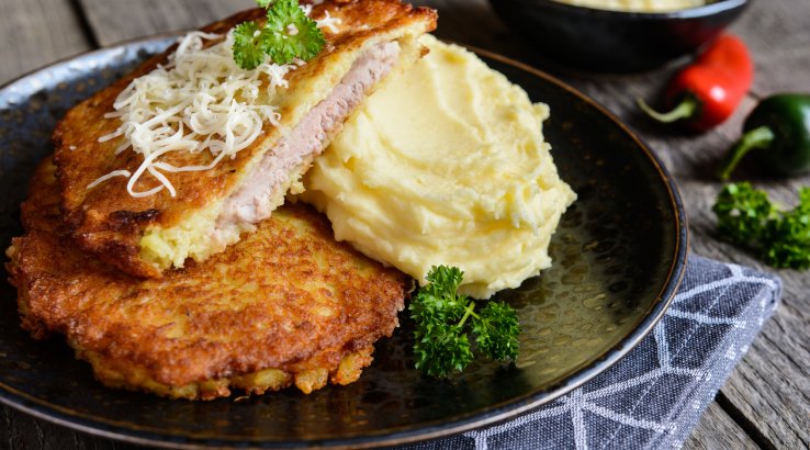 Свиняча відбивна в часниковому клярі