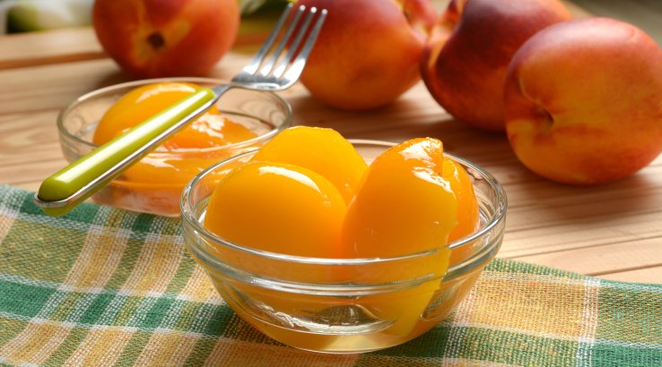 Персики, консервовані половинками